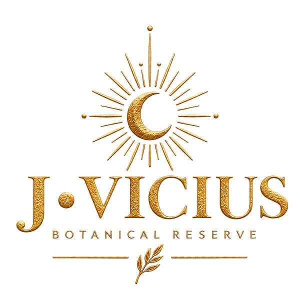 Gold textured logo for J. Vicius Botanical Reserve featuring a crescent moon and sunburst emblem above the text on a white background.